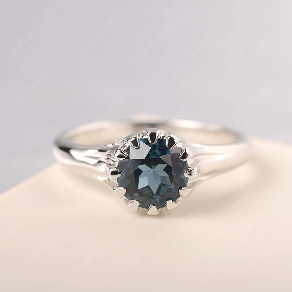 Flame Inspired London Blue Topaz Solitaire Ring