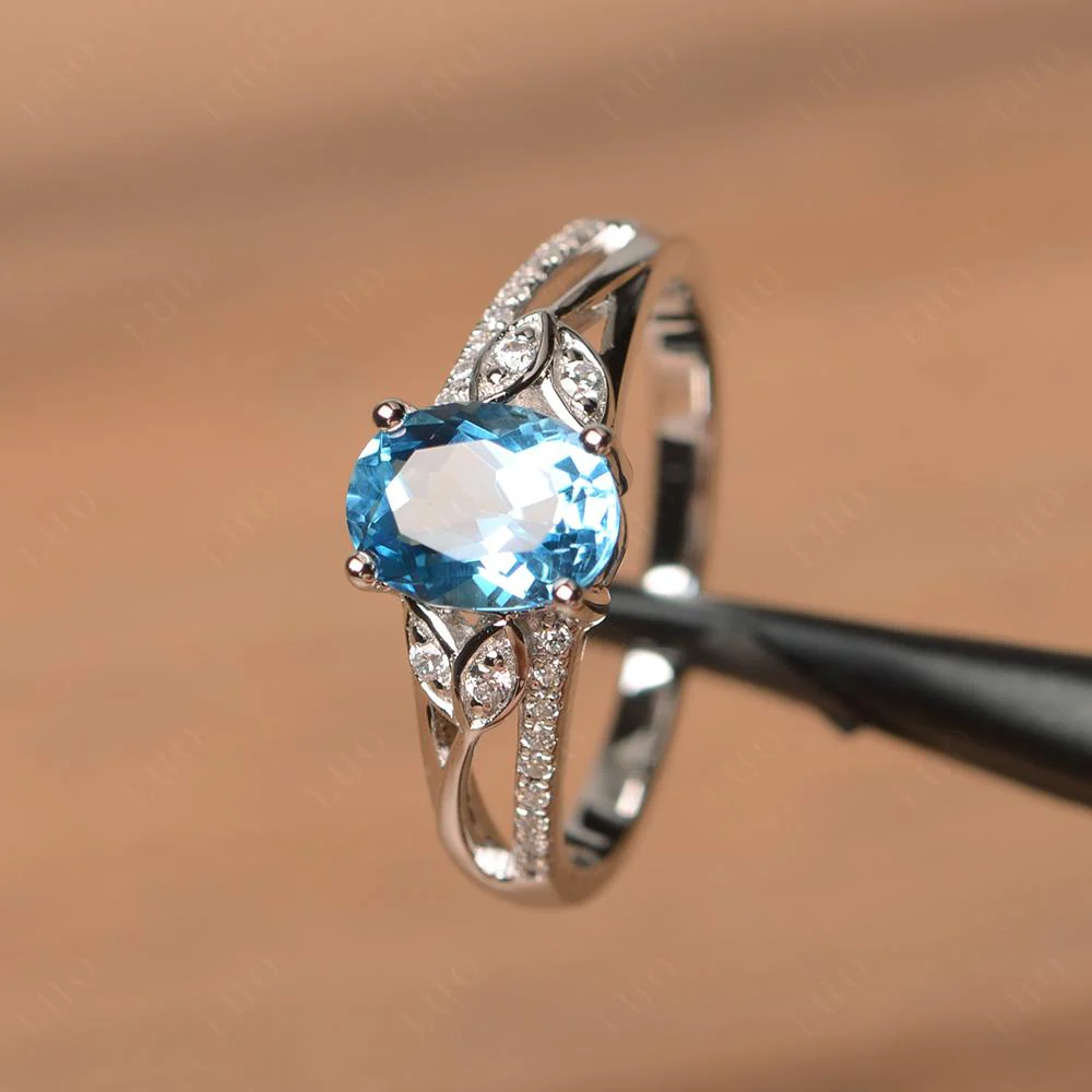 Oval Cut Swiss Blue Topaz Ring - Image 30