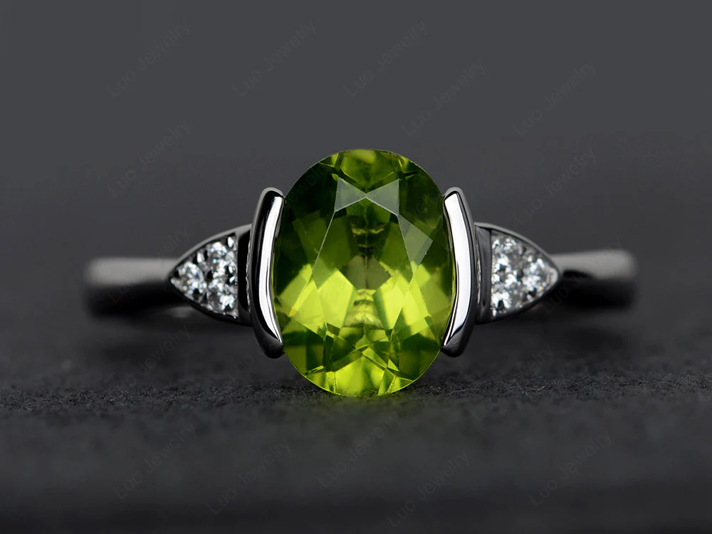 Oval Peridot Half Bezel Set Ring
