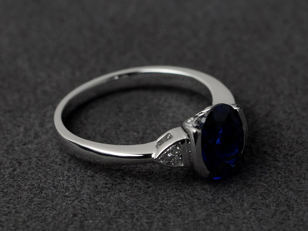 Oval Sapphire Half Bezel Set Ring - Image 2