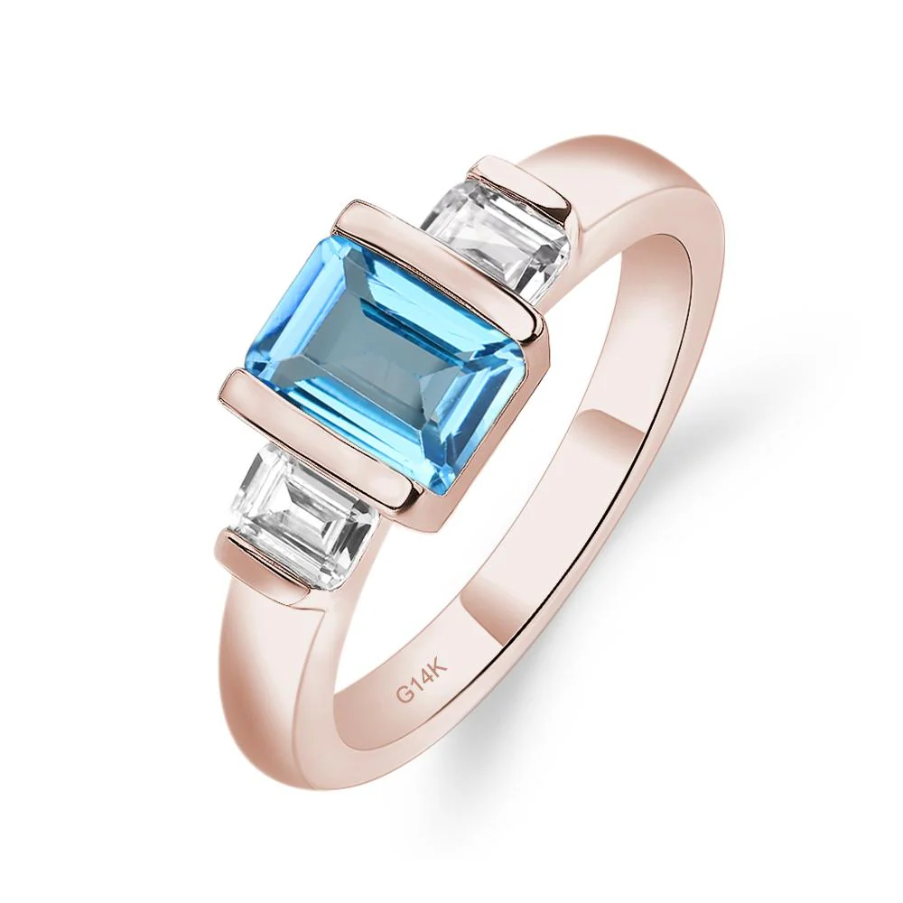 Swiss Blue Topaz Emerald Cut Three Stone Ring