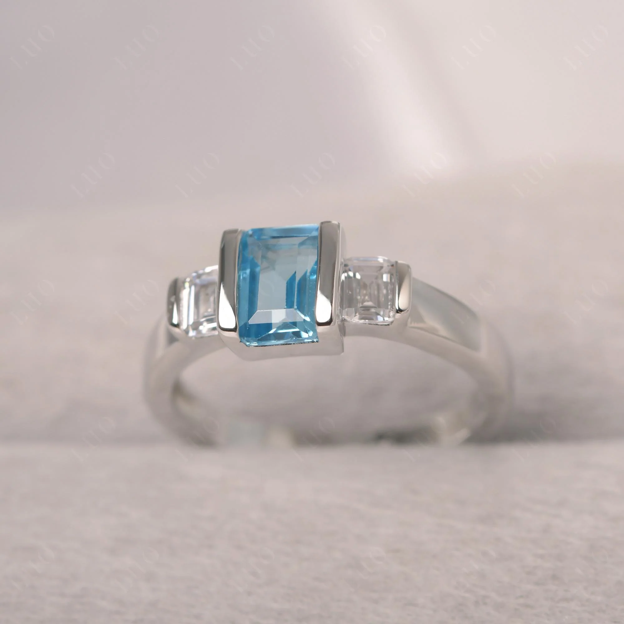 Swiss Blue Topaz Emerald Cut Three Stone Ring - Image 11
