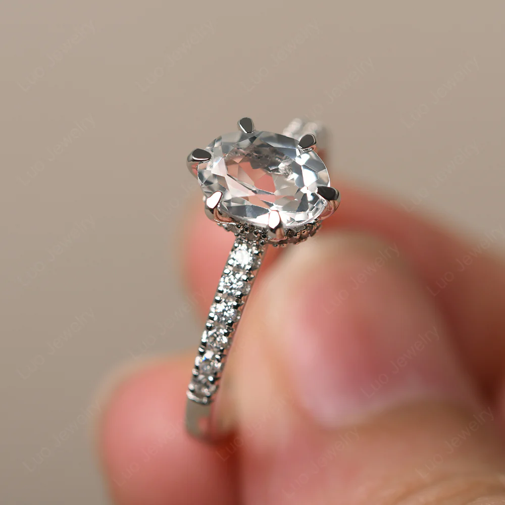 White Topaz Hidden Halo Oval Engagement Ring - Image 2