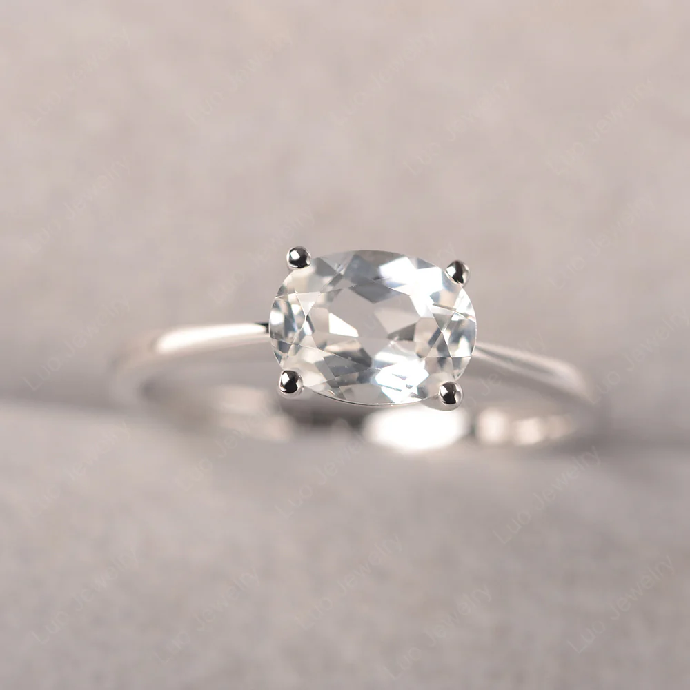 White Topaz Oval Solitaire Engagement Ring