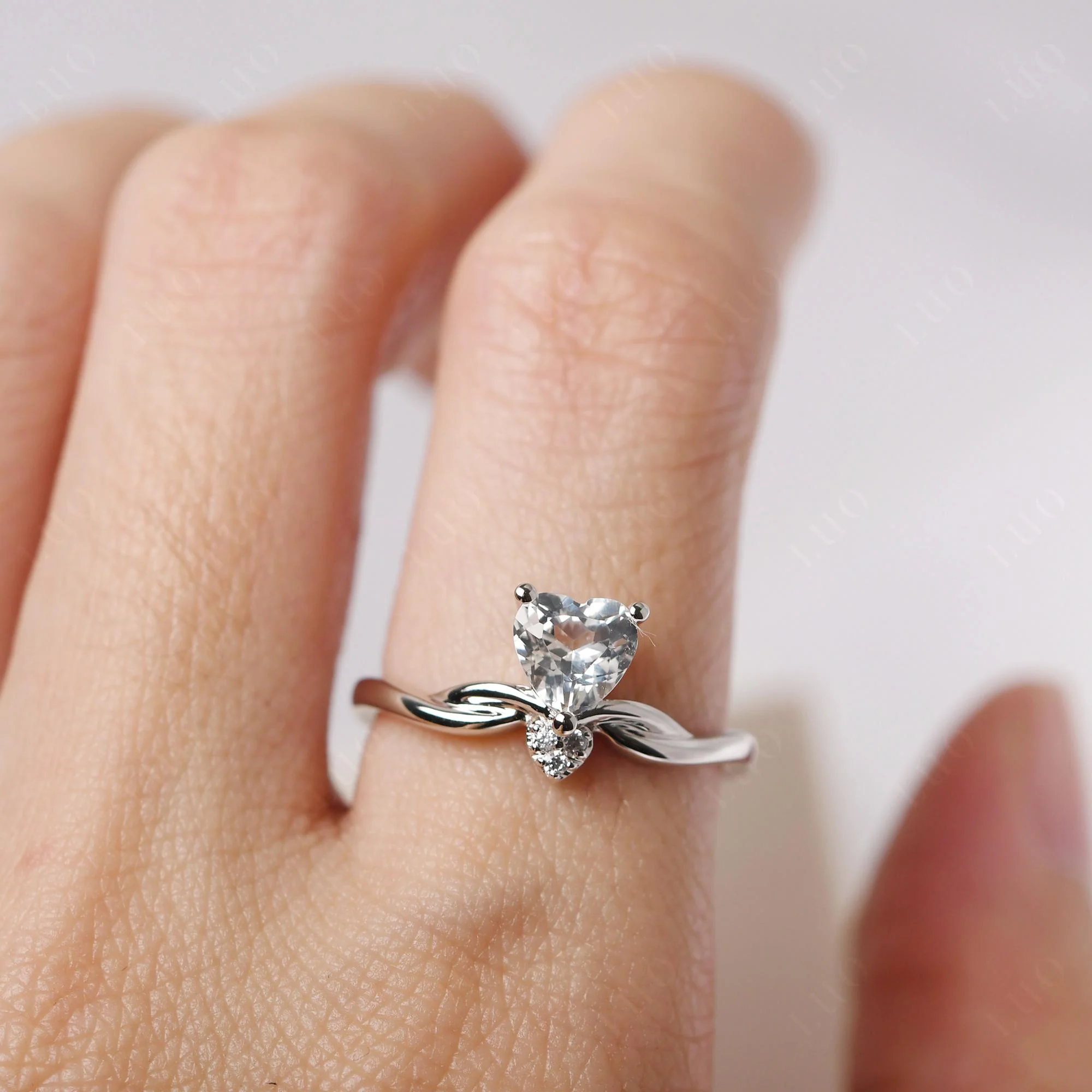 Dainty Twisted White Topaz Engagement Ring - Image 14