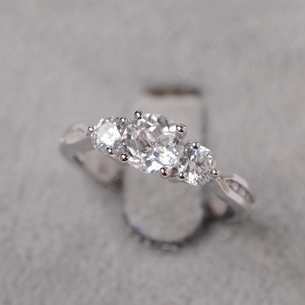 White Topaz Three Stone Engagement Ring